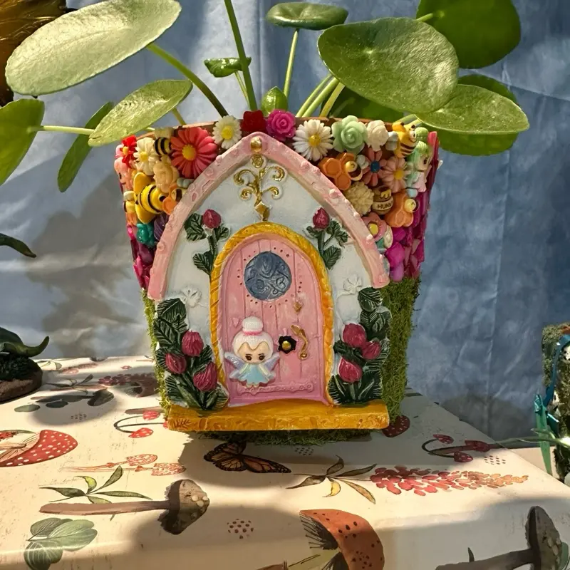 17. Handcrafted 4in Terracotta pot for home garden.