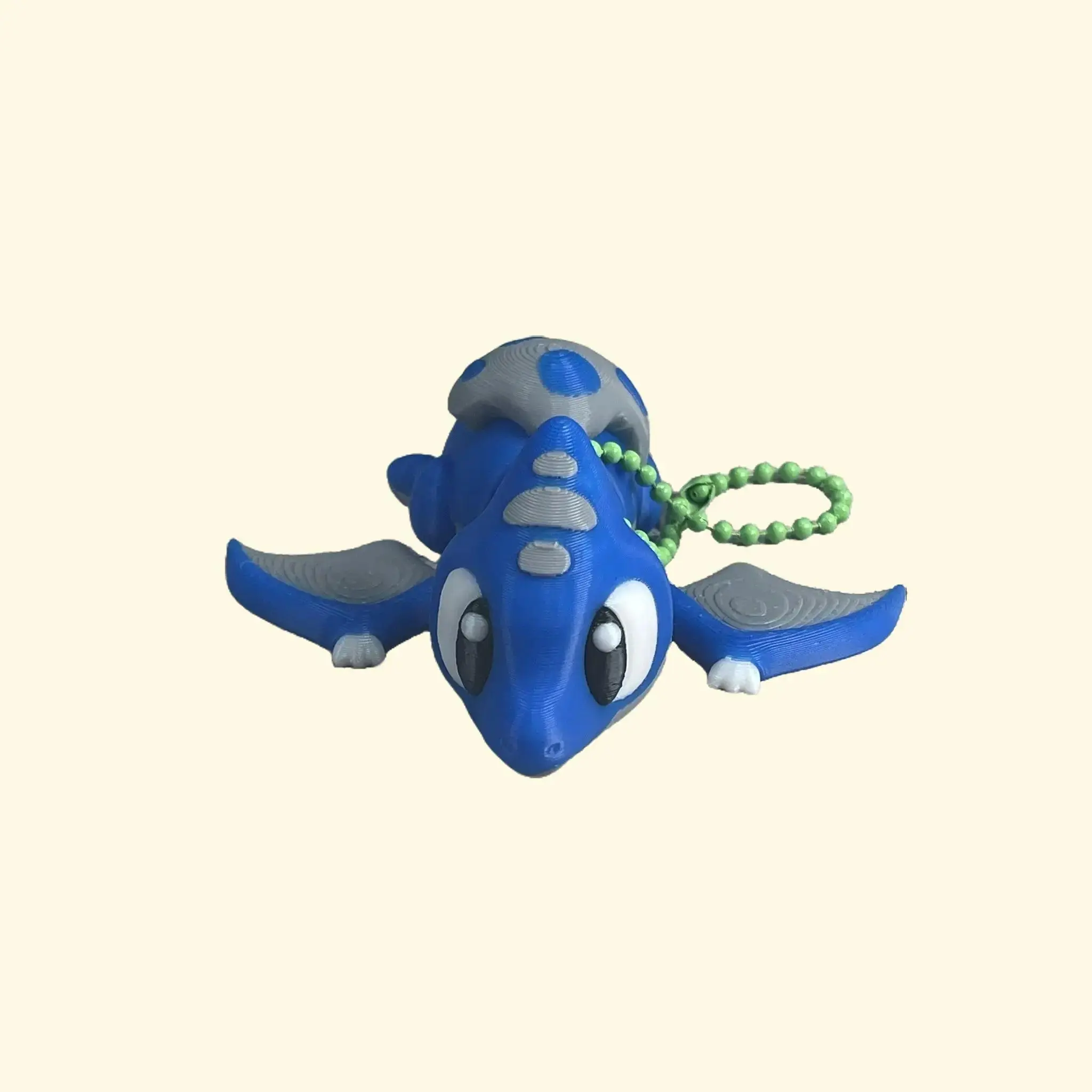 Cute Blue Flexi Baby Terradactyl Dinosaur Keychain - Playful Design with Egg and Fun Touch