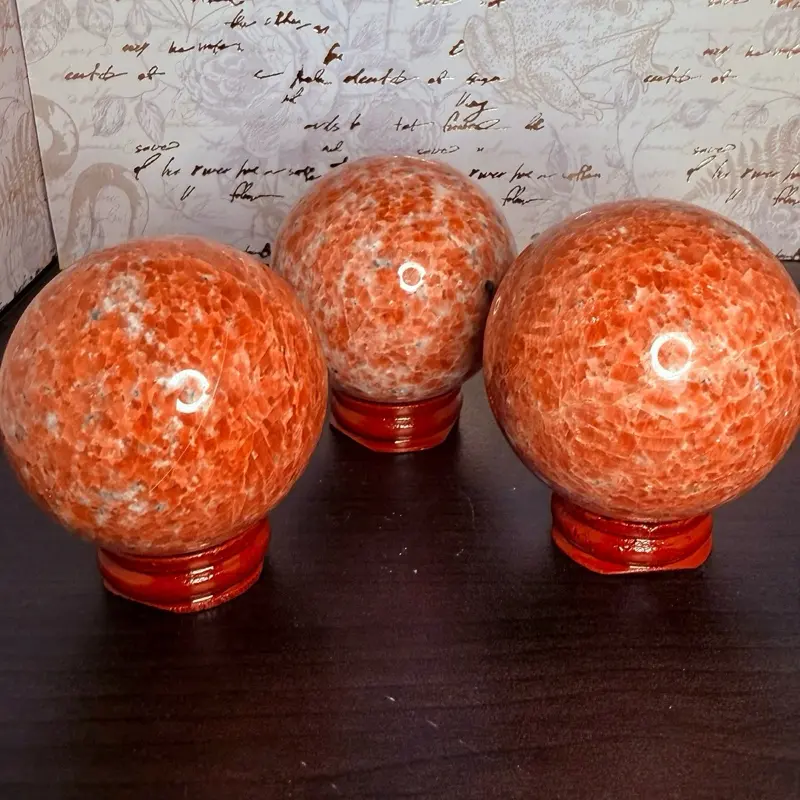 Sunstone sphere with stand Sunstone sphere with stand