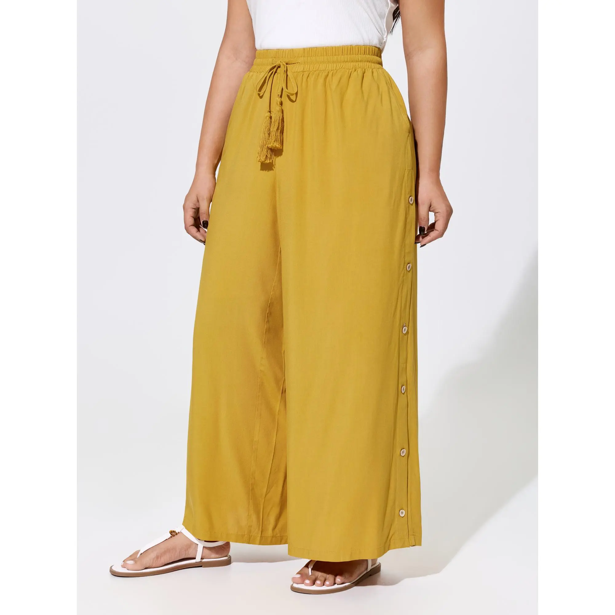 BloomChic Plus Size Solid Boho Rayon Baggy Pants with a Shirred Drawstring Waist, Tassels, and Side Pockets, Smooth, Oversize, Loose, Bottoms, Garment, Fabric, Fit, Pants For Women, Oversized, Mid Rise, Loose Fit, Plus Size Basics