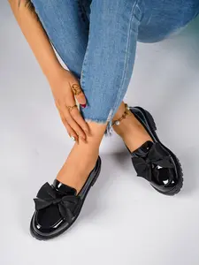 A pair of women's round-toe PU Leather Casual loafers with bow decoration, thick soles, and square heels, slip-on easy-to-wear design, sweet and fashionable style, stylish women's small leather shoes suitable for all seasons Footwear