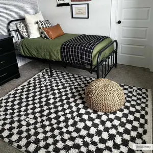 Kieu Black & White Checkered Area Rug perfect for any room