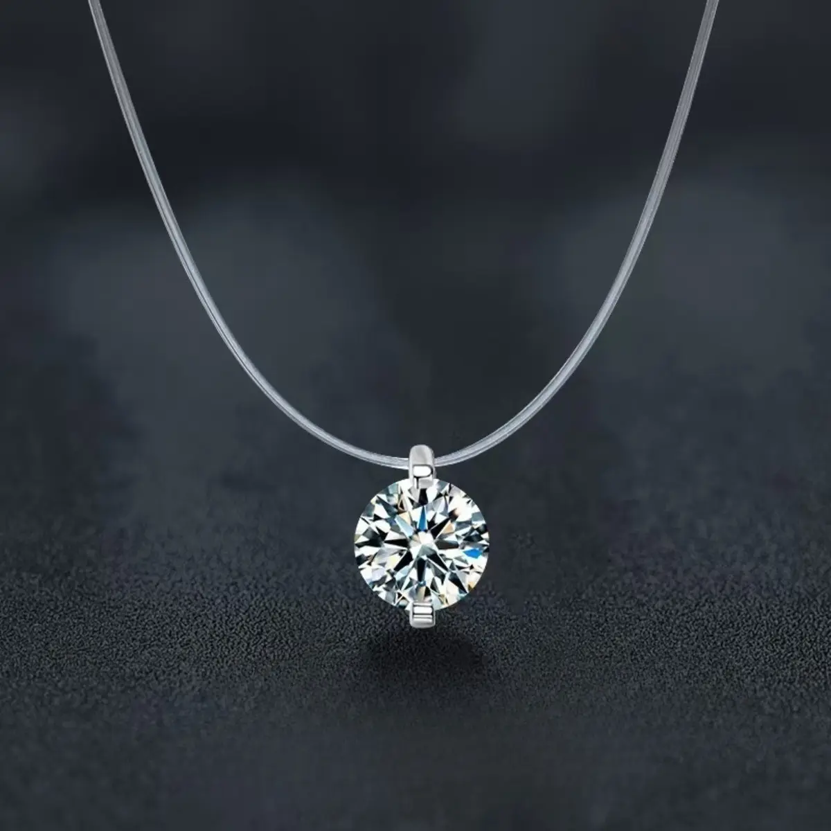 Women's Cubic Zirconia Pendant Necklace, a minimalist choker featuring an invisible clear cord. The length is adjustable, making it perfect for everyday layering. Ideal as a gift for women, for summer outfits, vacation looks, and beachwear. Made with a th