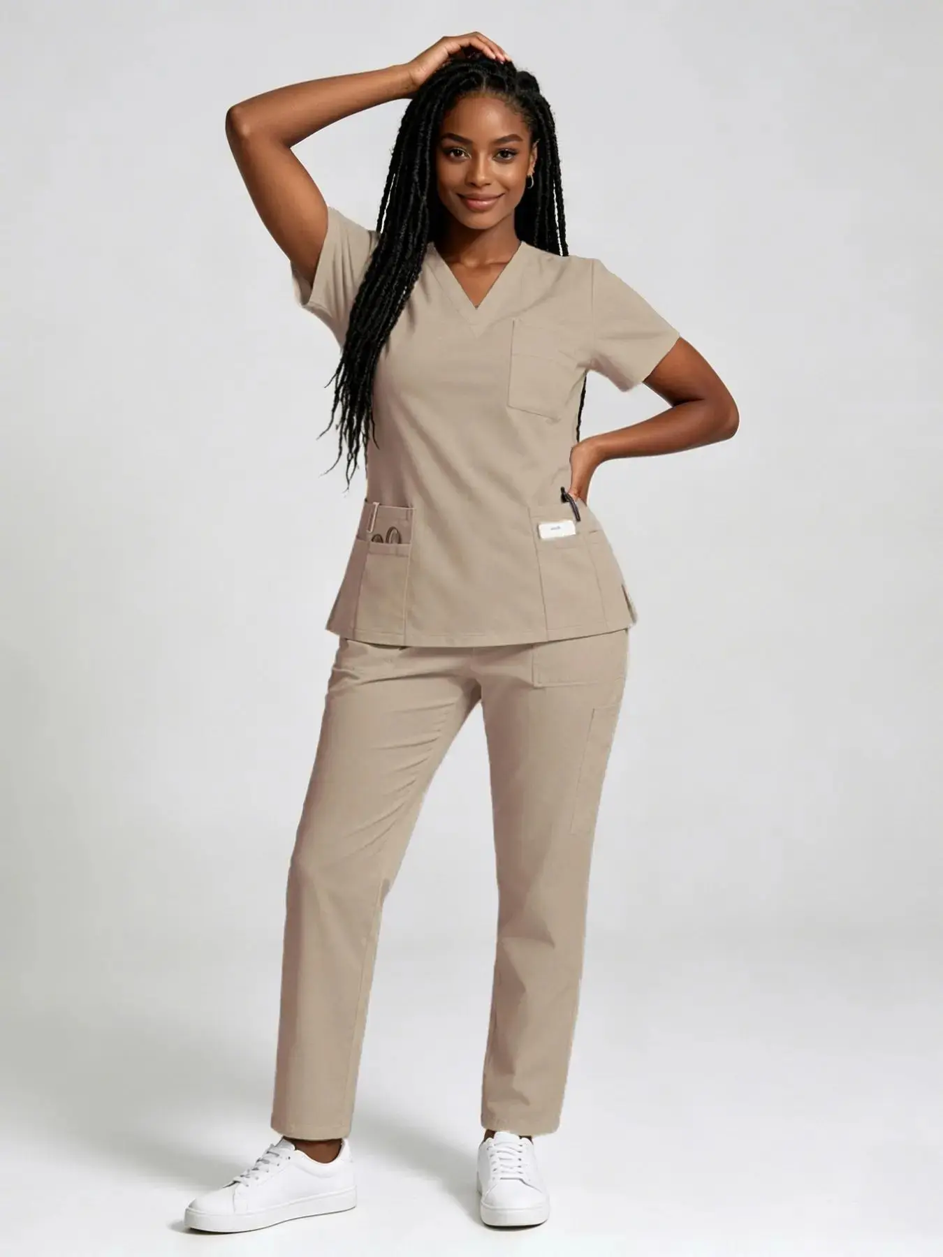 Women's Stretch Scrubs Set That Breathes!Featuring a trendy jogger style with multiple pockets, this smooth, quick-drying Workwear uniform lets you say goodbye to wrinkles & stuffiness for work and beyond. T-Shirt Coat