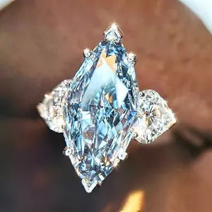 Elegant Three-Stone Wedding Band Featuring a Marquise Cut Blue Zirconia, Perfect for Proposals, Anniversaries, And Everyday Wear