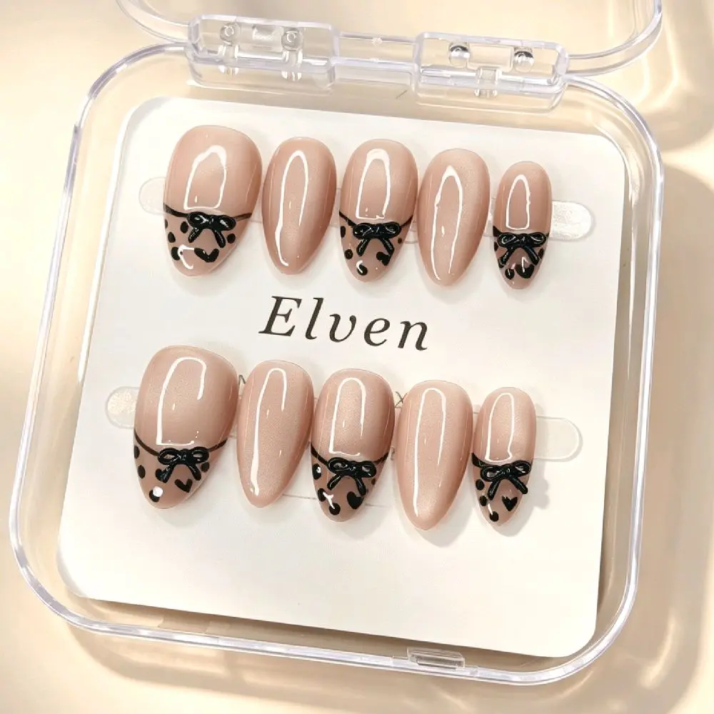Elegant Nude Handmade Short Almond Press-On Nails Short Almond with Black Bow Design for Stylish Manicure