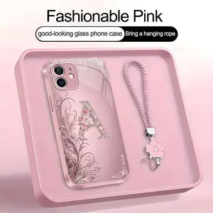 Suitable for [iPhone 12 Mini] high-end women's phone case🤩，a beautiful four-leaf clover lanyard is included🍀，Exquisite floral print, non-3D rhinestones, 26 letters to choose from YM99