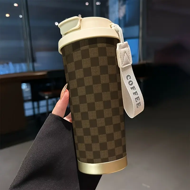 1 18-ounce stainless steel insulated travel mug.Brown plaid print.Comes with a handle strap.Includes a straw.Outdoor mug.Travel mug.Coffee mug.Birthday gift.Christmas gift.Halloween gift