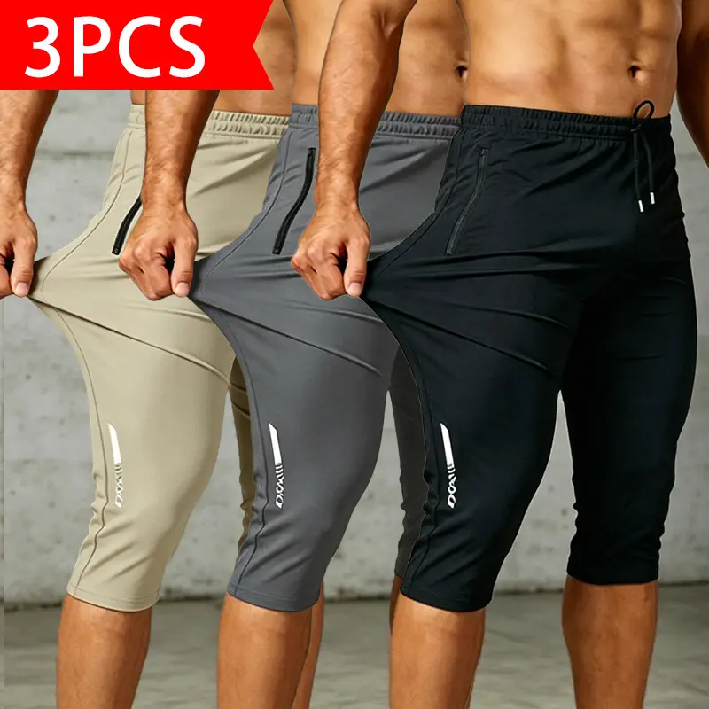 3 packs men’s 7-inch knee-length athletic shorts; stretch quick-dry cropped workout capri pants; running gym shorts with zippered pockets and drawstring waist; lightweight breathable sport training capri trousers; solid multi-color men’s casual fitness bo