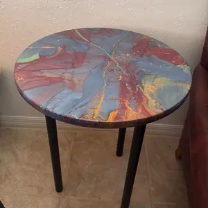 Custom Epoxy Table with Vibrant Marbled Design and Sleek Black Legs for Modern Home Decor