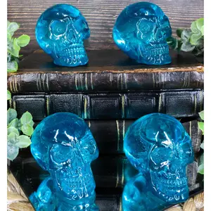 Set Of 4 Blue Translucent Witching Hour Gazing Skull Acrylic Miniature Figurines