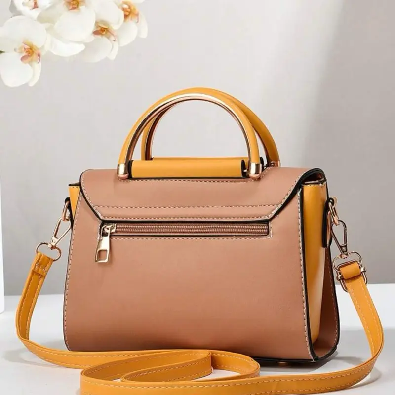 Women's Hand Bag in Peach with Yellow Handles, Adjustable Strap, and Zippered Closure