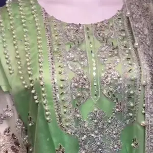 Elegant Green Embroidered Dress with Pearls and Rhinestones for Special Occasions