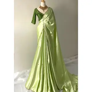 Silky Green Handwork Satin Saree Set Elegant satin saree in a rich silky green shade, beautifully detailed with delicate handwork. Soft, smooth, and flowy fabric that drapes perfectly. Comes with a matching blouse for a complete classy look. Perfect for p