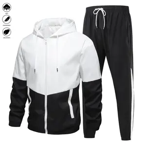 Men's and women's universal fashionable sports set, color-matched patchwork, drawstring, hooded jacket, comfortable and breathable sports pants, suitable for all seasons and great as an outdoor or festival gift.