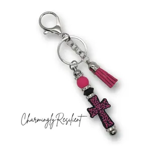 Charmingly Resilient Pink Cross Breast Cancer Keychain with Tassel and Beaded Accents for Stylish Accessory