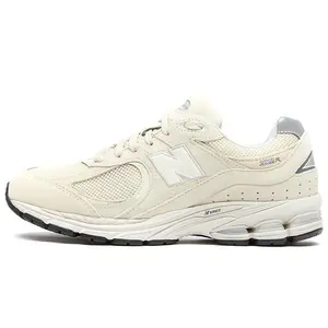 New Balance NB 2002R Low-Top Casual Running Shoes with Mesh and Suede for Men and Women in Light Beige new balance 2002r  cloud
