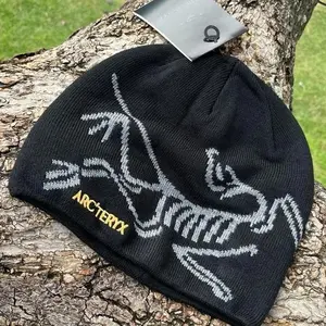 Arc'teryx Inspired Knit Beanie Hat – Black & Grey | Large Bird of Prey Logo | Gold Embroidered Text | Soft Warm Skull Cap | Y2K Gorpcore Streetwear | Unisex Ski Hiking Outdoor Winter Hat | Gift for Him & Her