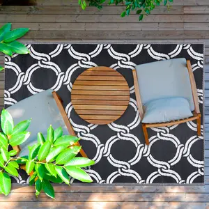 Mykonos Black White 4 ft. x 6 ft. Reversible Recycled Plastic Indoor/Outdoor Area Rug