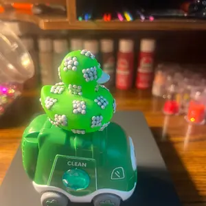 Green rubber duck with white bedazzle