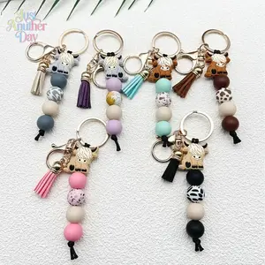 [Highland Cow Keychain] Cute Highland Cow Silicone Beaded Keychain with Tassel | Cartoon Punk Style, Animal Theme, Lobster Clasp, Decorative Backpack Accessory, Car Key Anti-Lost Chain | Ideal Gift for Friends and New Year Festivities