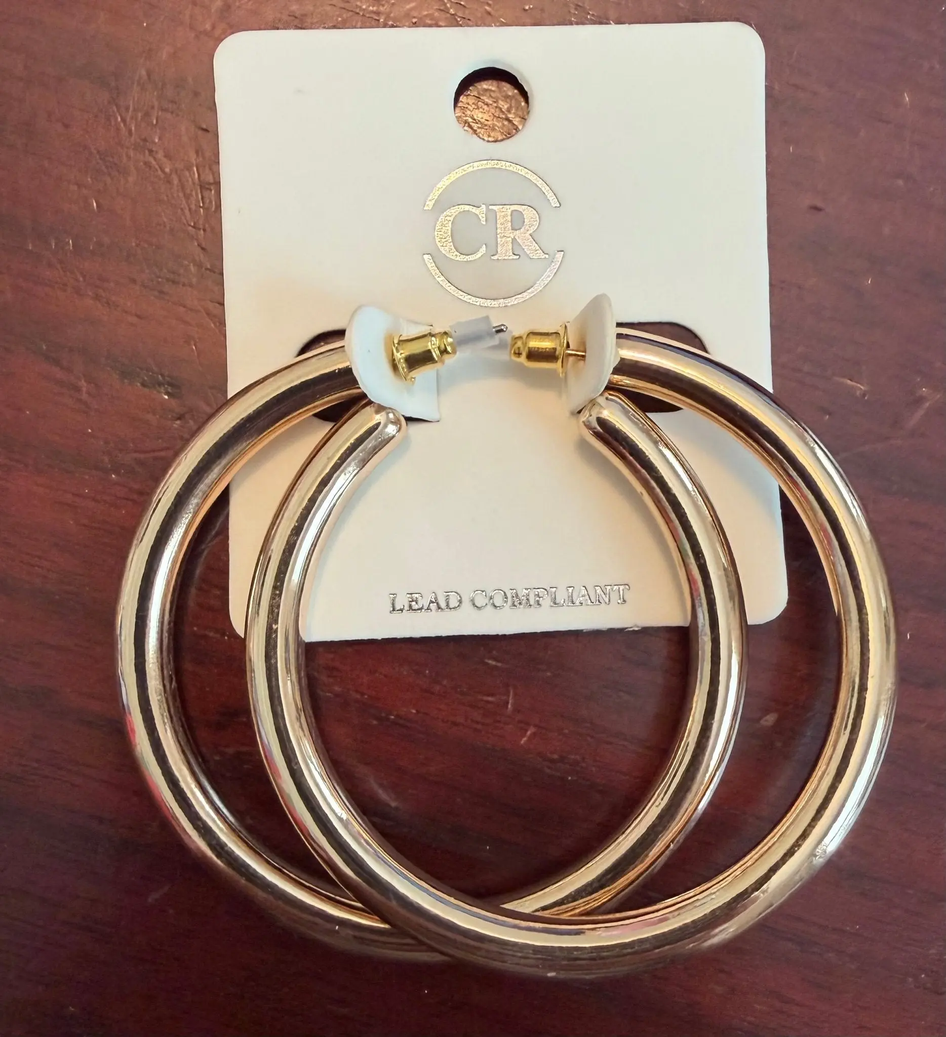 Gold round earrings