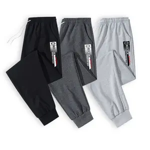 Essential Men's Performance Joggers Highlighting the Bold PREMIUM SPORT WEAR Logo Print with Red Elite Detail Offering Both Style and Function for High-Level Comfort During Workouts or Relaxation