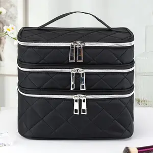 Fashionable, luxurious, large-capacity black embroidered diamond-patterned makeup bag with three layers, double layers, multi-layer storage compartments.Portable handbag suitable for home and travel use.