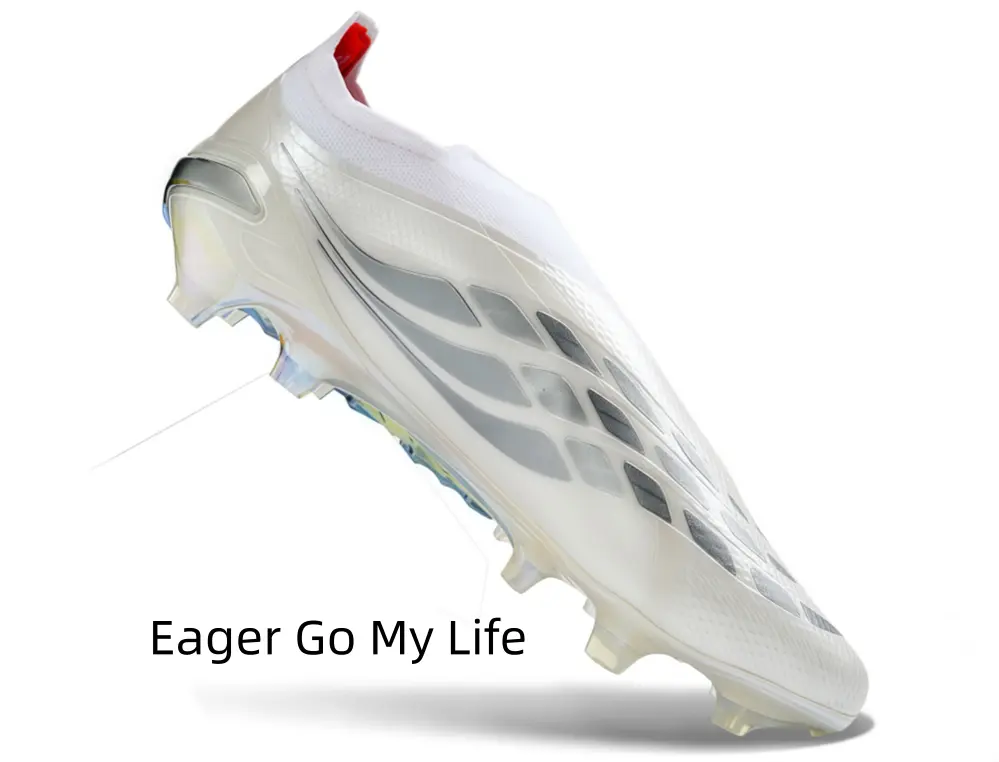 All white everything! ️ These laceless boots are pure class on the pitch. Who's rocking these?