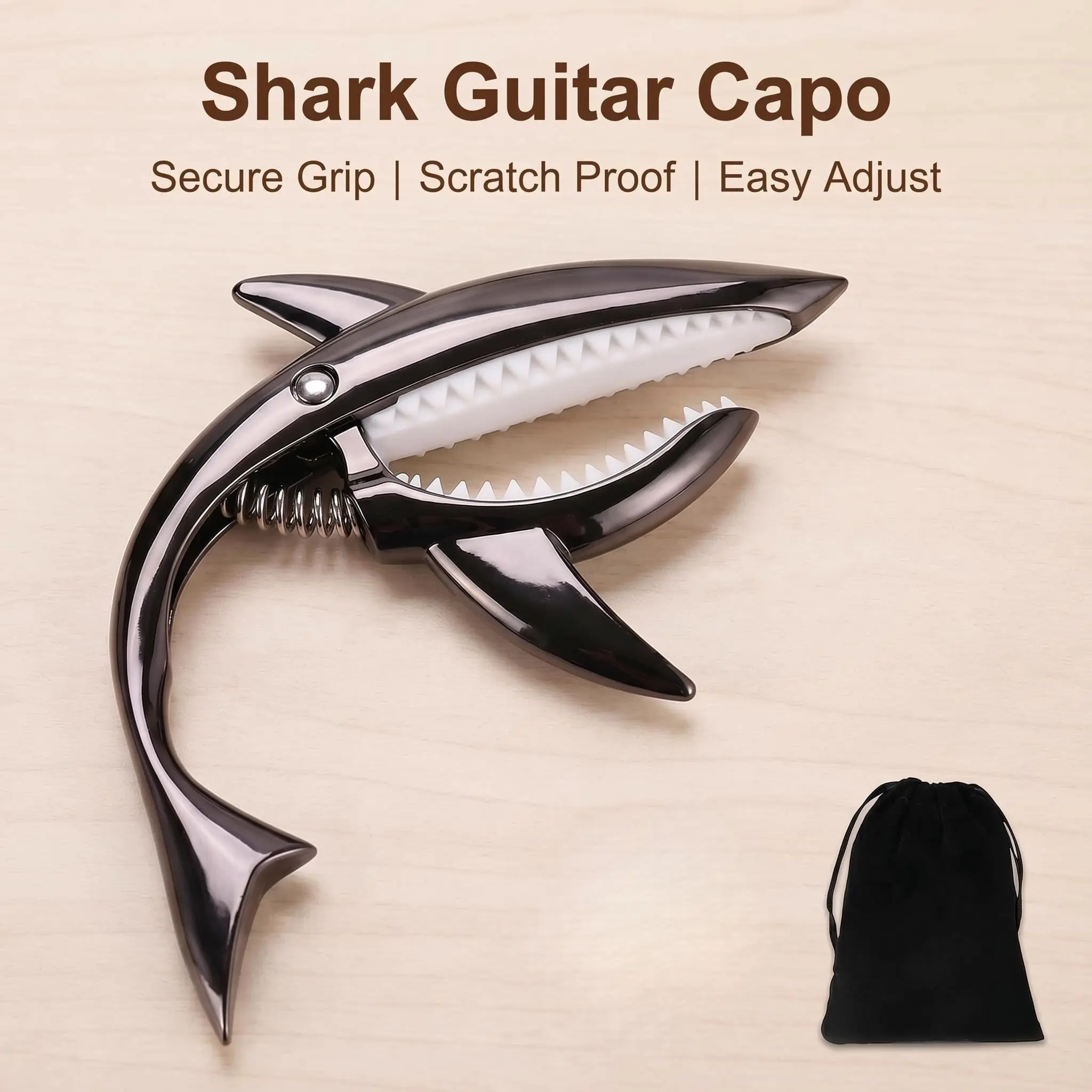 Shark-shaped Guitar Capo for Acoustic Guitar – Cool Shark Design with Soft Silicone Pads to Protect Your Guitar. It makes changing keys easy and makes a perfect gift for guitar enthusiasts, ideal for birthdays and Christmas.