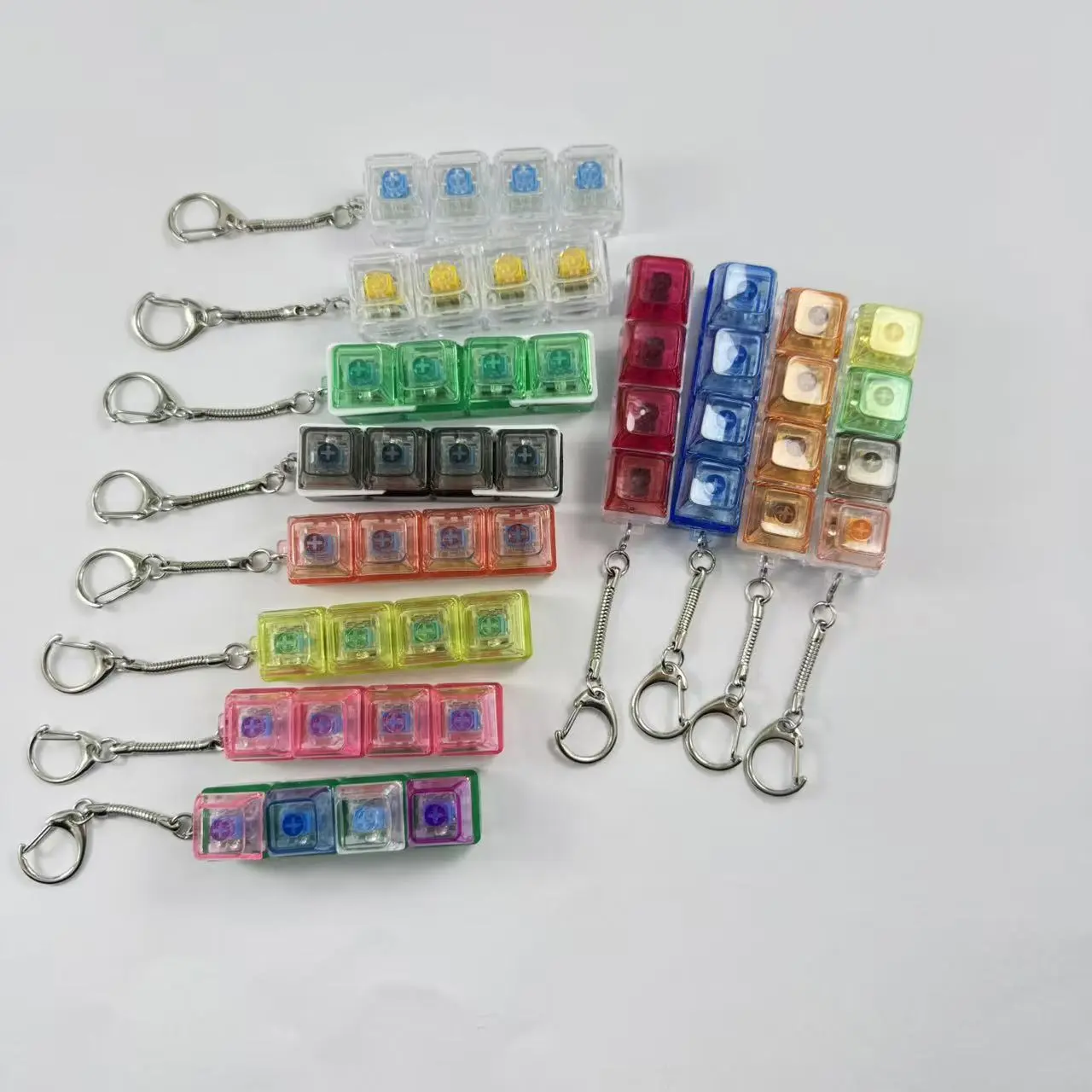 4-key decompression button, Russian Tetris keychain, mechanical key with light-emitting function, stress-reducing fingertip toy key. 4-key decompression button, Russian Tetris keychain, mechanical key with light-emitting function, stress-reducing fingertip toy key.