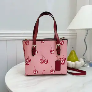 Cherry Hand Bag - Pink with Cherry Pattern, Brown Handles, Zippered Closure, Ideal for Everyday Use