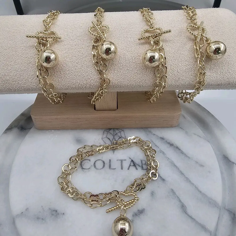 (79) new bracelet with heart 13 k gold plated.