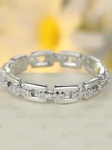 A circular white diamond-cut chain ring with synthetic white crystals, featuring a stylish and minimalist design, suitable for everyday wear during weddings.