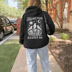 Chronic Pain Is Trying To Murder Me Hoodie | Crow Chronic Illness Hooded Sweatshirt | Dark Humor Flare Day Shirt | Goth Spoonie Gift