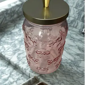 Elegant Pink Glass Jar with Gold Lid and Bow Design for Kitchen Storage