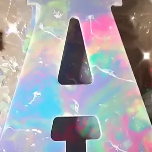 Large paint pour letter