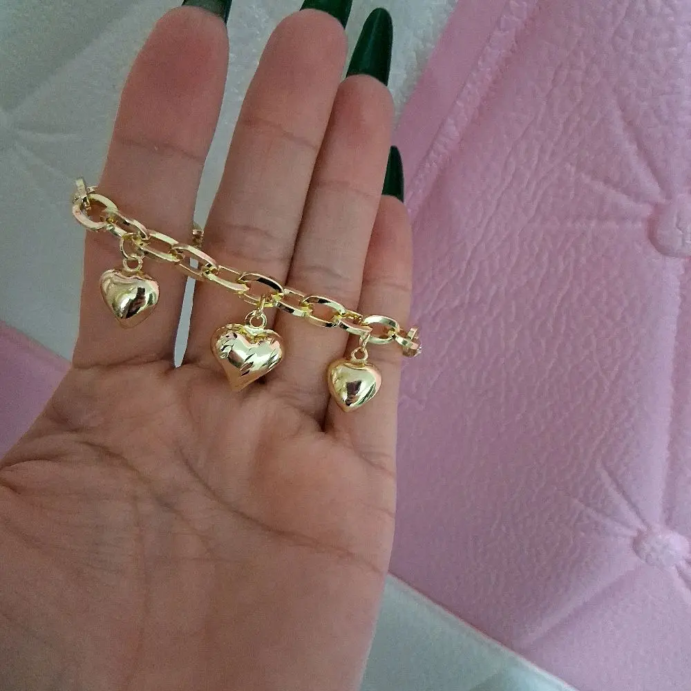 7 -inch hart charm bracelet with dangling hearts ,14 k gold laminated