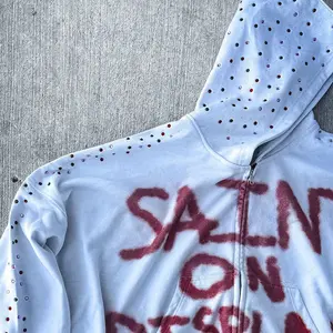 Retro washed street style with graffiti letter print, unisex—hip-hop, gothic, and retro urban street styles. Fashion sweatshirt #Y2K hoodie #studded hoodie #graffiti print #hip-hop streetwear