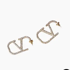 Pre-owned Valentino gold plated Bag Accessories Garavani VLogo Signature Earrings In Metal And Swarovski Crystals
