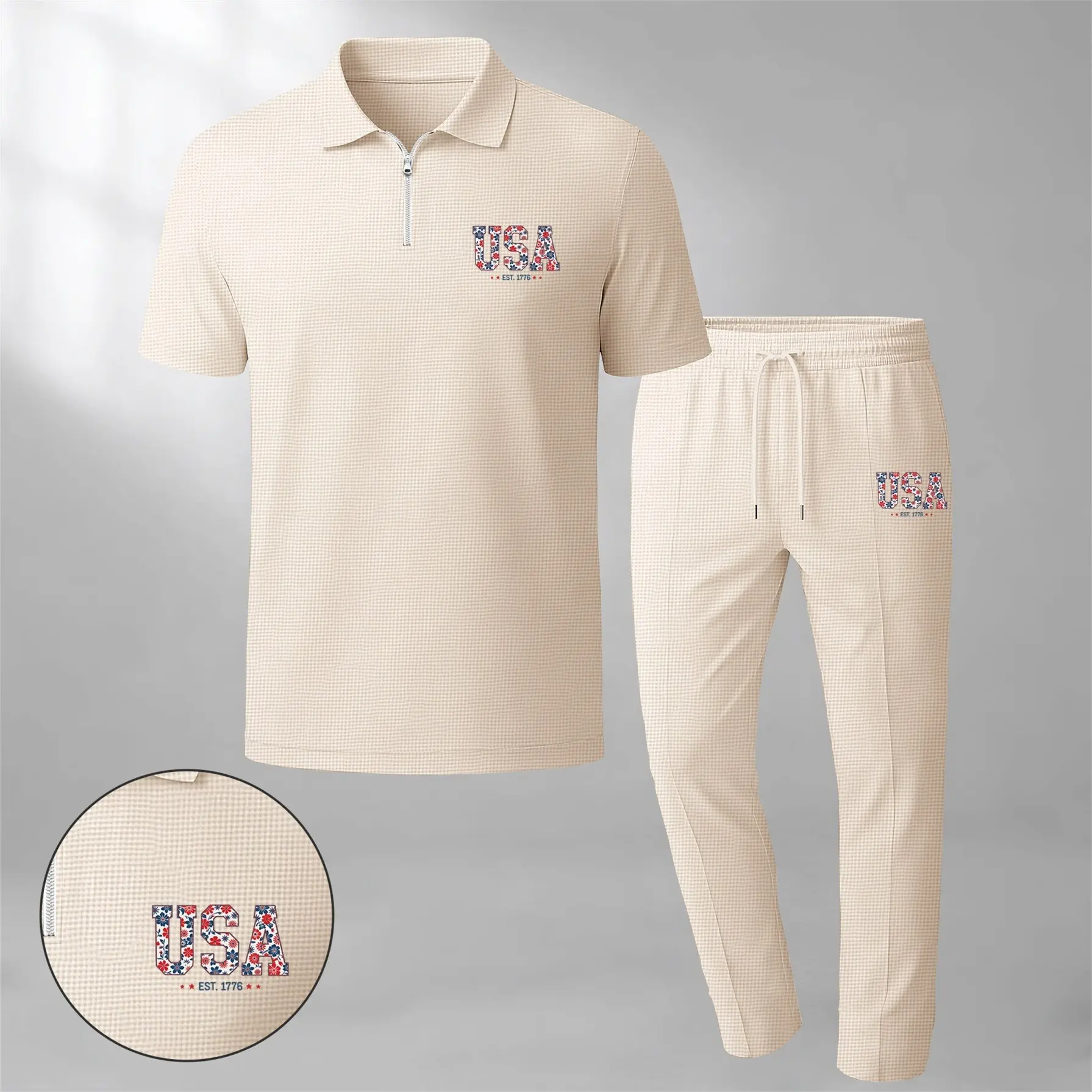 Men's classic two-piece set—featuring a short-sleeve polo shirt with a zip collar and "USA" logo, paired with matching trousers—is crafted from breathable, soft-textured waffle-knit fabric. Designed with a relaxed fit, it is ideal for everyday casu