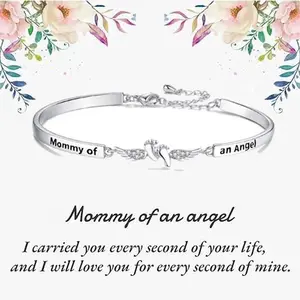 Footprint and angel charm bracelet, a perfect everyday accessory, adjustable length.