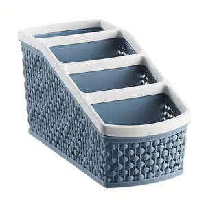 A plastic trapezoidal storage box with four compartments, a desktop remote control storage box, a space-saving container suitable for home offices, living rooms and bedrooms