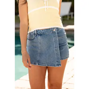 A Solid Choice Medium Wash Wrap Denim Skort