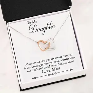 Mom Giving Daughter Interlocking Hearts Necklace You're Smarter Than You Think Necklace with Message Inside