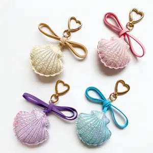 Elegant Pink Seashell Keychain with Heart Shaped Clasp, Fashionable Shell Bag Charm with Bow Detail, Cute Key Ring Pendant for Backpack, Handbag, Keys, Women, Girls, Gift