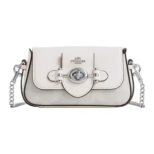 COACH Brie Mini 15 White Canvas and Leather Crossbody Bag with Chain Strap and Twist Lock Closure for Women