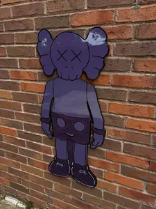 PURPLE KAWS FIGURE