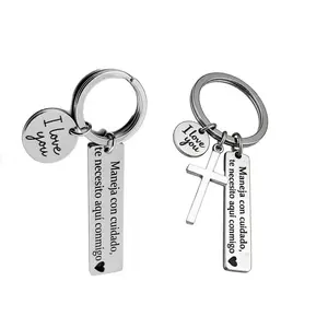 Stainless steel driving safety keychain, creative couple car pendant, blessing gift in Spanish