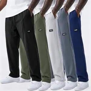 Pack of 5 men’s all-season casual athletic pants featuring a drawstring waist and straight leg cut, made from lightweight, comfortable, breathable fabric—ideal for daily commuting, work, travel, jogging, hiking, outdoor activities, and more.